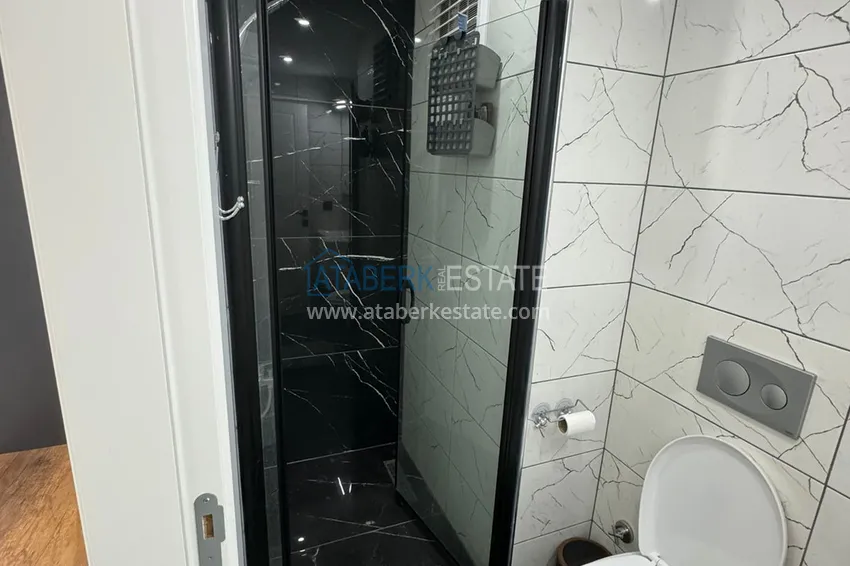 Приобрести Двухкомнатная квартира с мебелью в благоустроенном комплексе – Мерсин, район Томюк 9