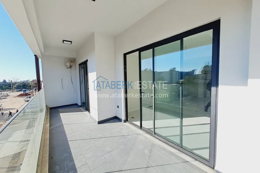 Приобрести Просторная двухкомнатная квартира 89 м2 в элитном комплекс-отеле – Алания, район Тюрклер 10 