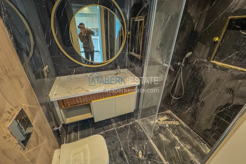 Приобрести Две новые квартиры с качественной отделкой в премиальном комплексе – Тосмур, Алания 18