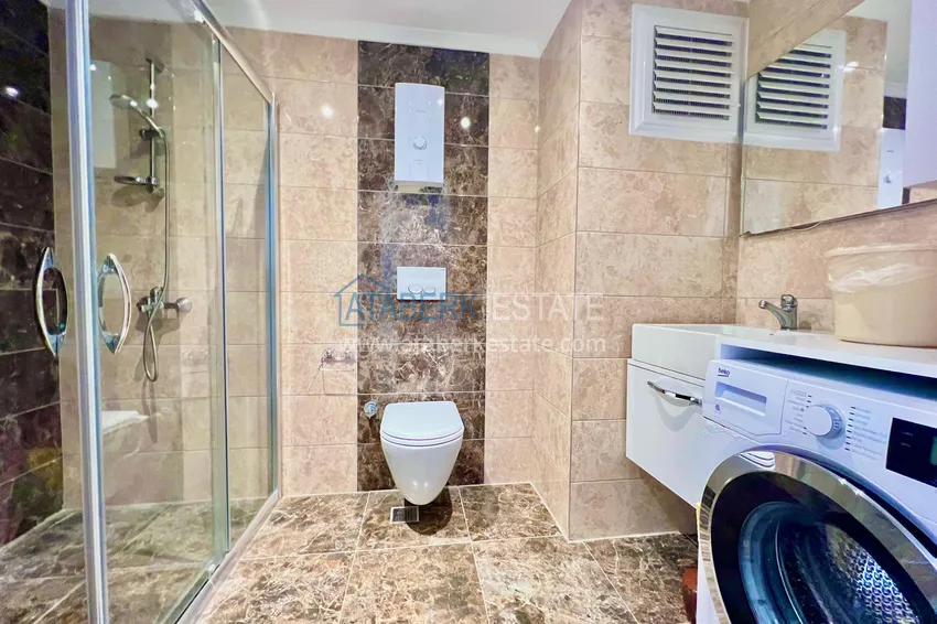 Приобрести Трехкомнатная квартира под ключ в Алании, район Кестель 11