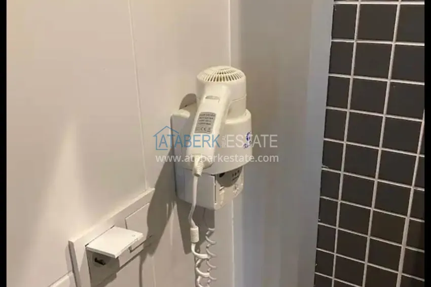 Приобрести Трехкомнатная квартира с мебелью и панорамным видом в районе Джикджилли Алания 13 