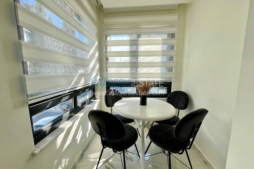 Приобрести Стильная двухкомнатная квартира с мебелью в центре Алании – первичный рынок 13 