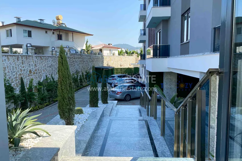 Стильная двухкомнатная квартира под ключ от собственника в Алании район Махмутлар 11 