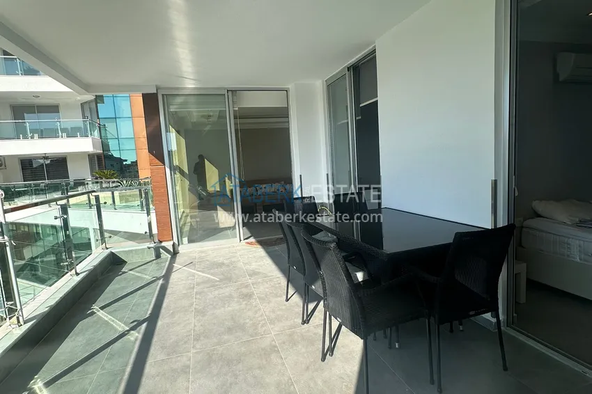 Приобрести Трехкомнатная квартира с мебелью и панорамным видом в районе Джикджилли Алания 14 