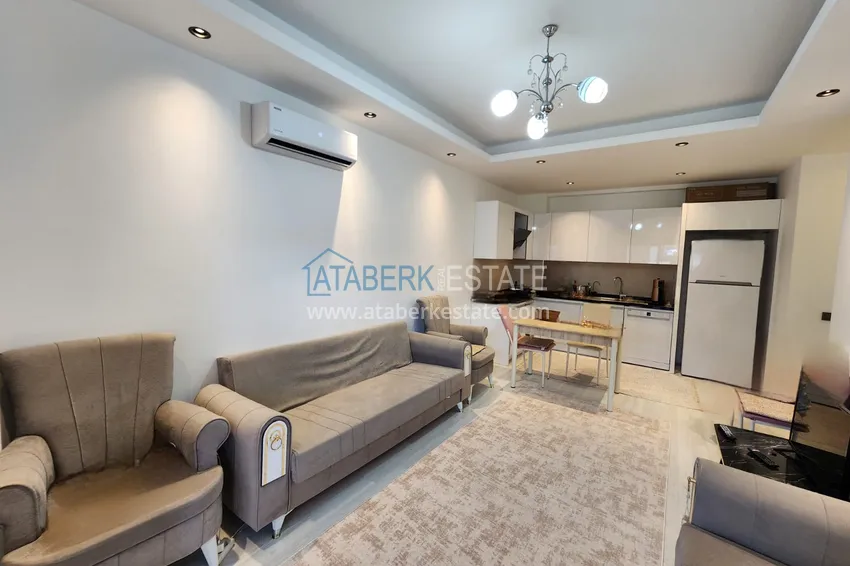 Приобрести Двухкомнатная квартира в районе Оба, в комфортабельном комплексе 1 