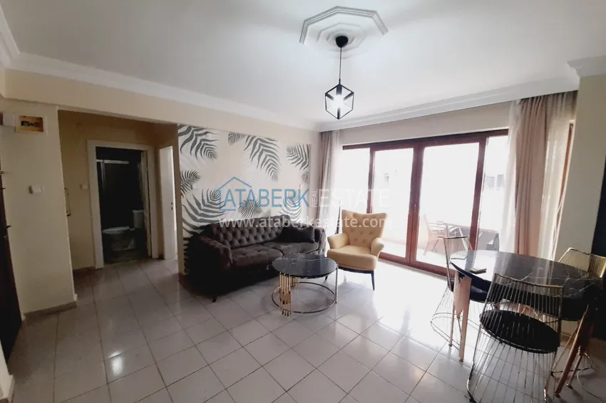 Приобрести Двухкомнатная квартира с мебелью у моря в районе Махмутлар Алания 3 