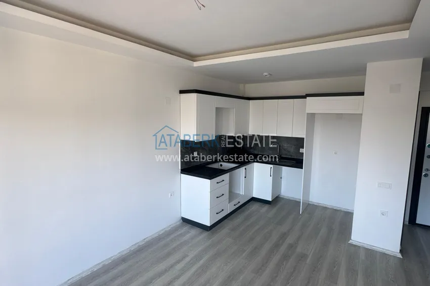 Приобрести Двухкомнатная квартира с чистовой отделкой и двумя балконами – Мерсин, Томюк 3 