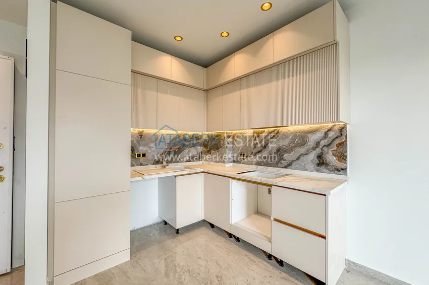 Приобрести Две новые квартиры с качественной отделкой в премиальном комплексе – Тосмур, Алания 12