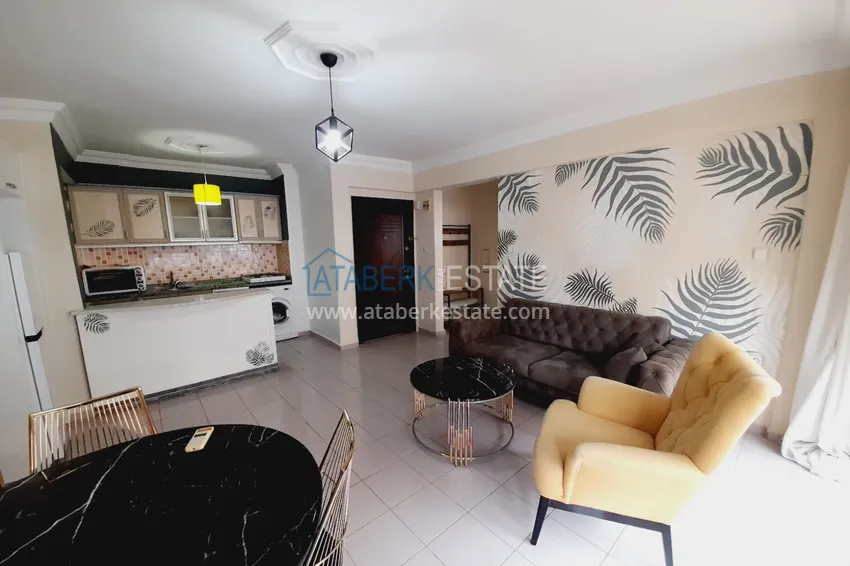 Приобрести Двухкомнатная квартира с мебелью у моря в районе Махмутлар Алания 5 