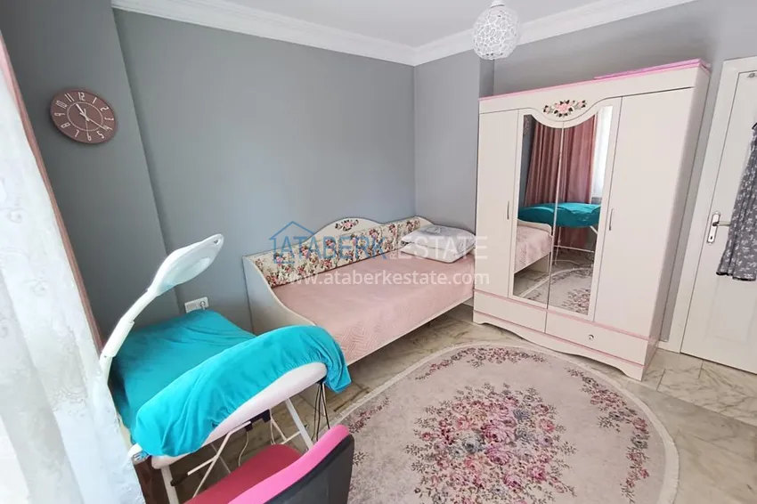 Приобрести Трехкомнатная квартира с мебелью в Алании, район Махмутлар - всего в 350 метрах от моря 5