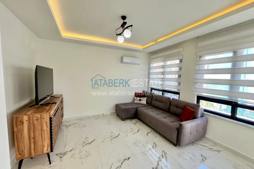 Приобрести Стильная двухкомнатная квартира с мебелью в центре Алании – первичный рынок 5 