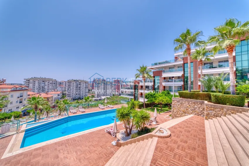 Трехкомнатная квартира с мебелью и панорамным видом в районе Джикджилли Алания 6 