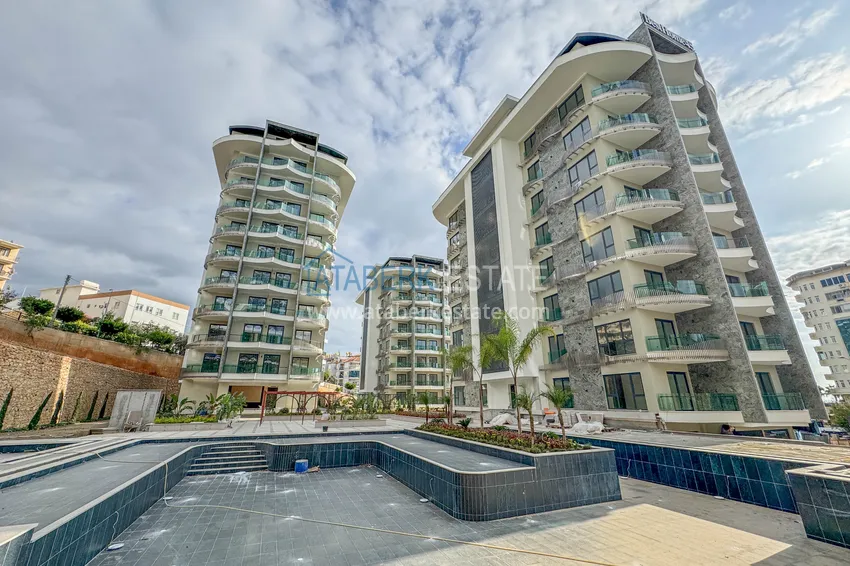 Две новые квартиры с качественной отделкой в премиальном комплексе – Тосмур, Алания 6