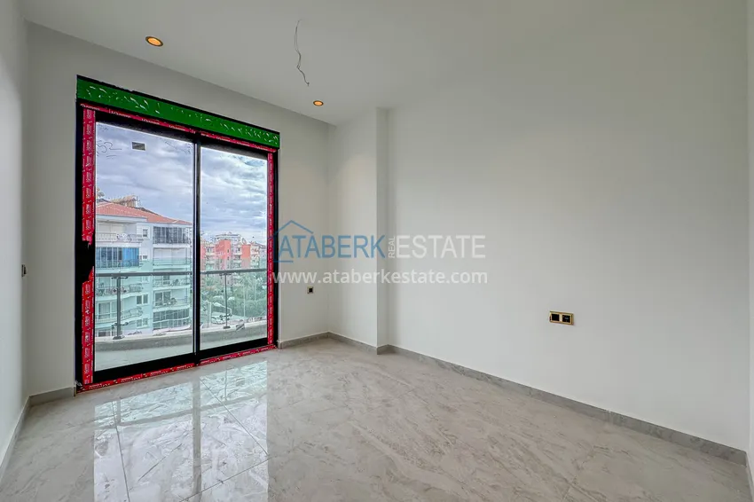 Приобрести Две новые квартиры с качественной отделкой в премиальном комплексе – Тосмур, Алания 14