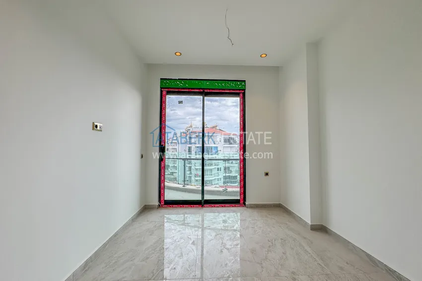 Приобрести Две новые квартиры с качественной отделкой в премиальном комплексе – Тосмур, Алания 15