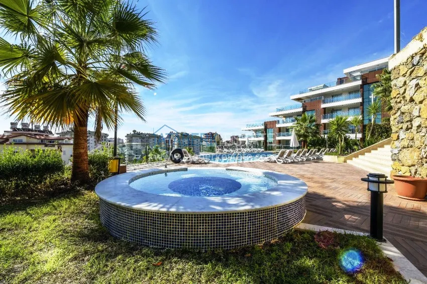 Трехкомнатная квартира с мебелью и панорамным видом в районе Джикджилли Алания 8 