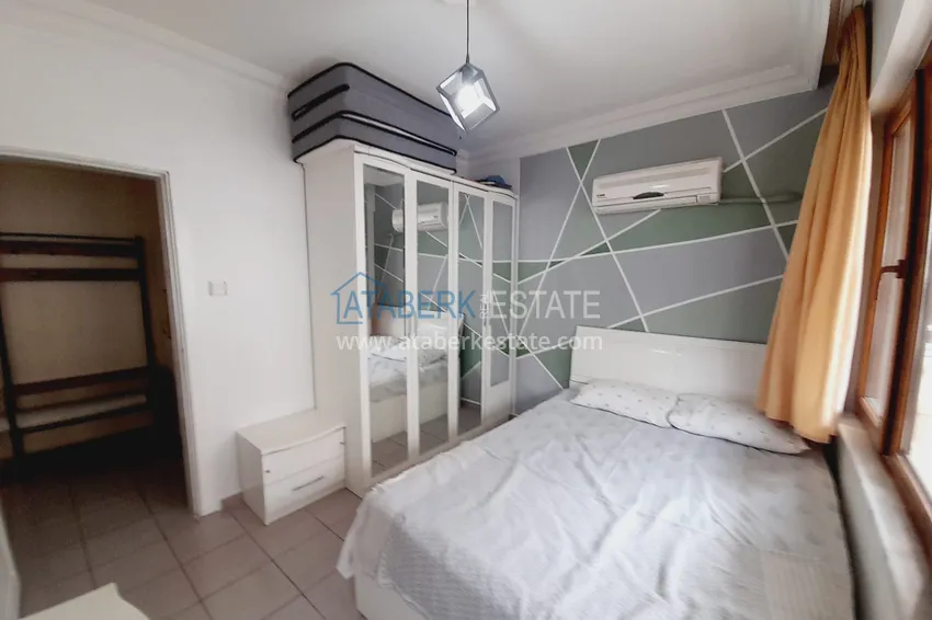 Приобрести Двухкомнатная квартира с мебелью у моря в районе Махмутлар Алания 8 