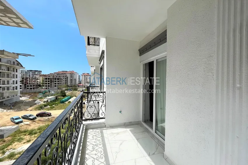 Приобрести Двухкомнатная квартира с мебелью в Алании, район Махмутлар 9