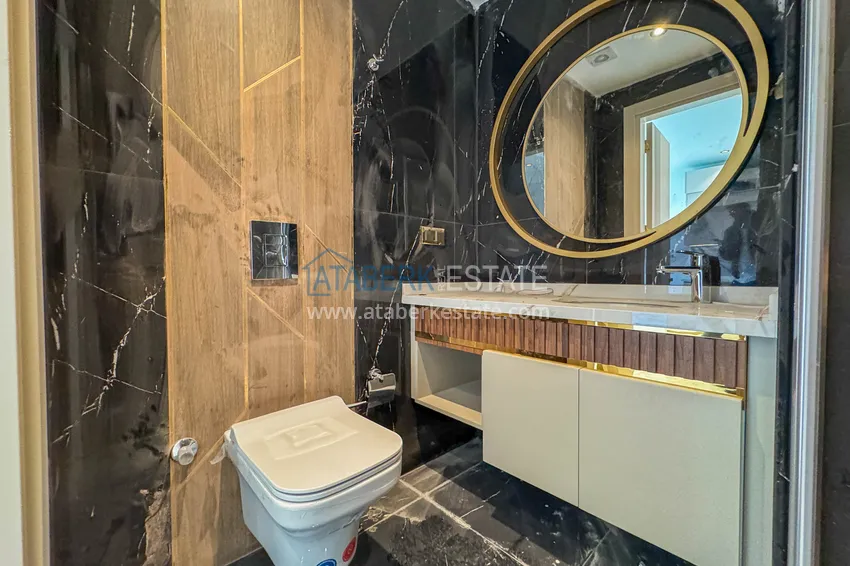 Приобрести Две новые квартиры с качественной отделкой в премиальном комплексе – Тосмур, Алания 17