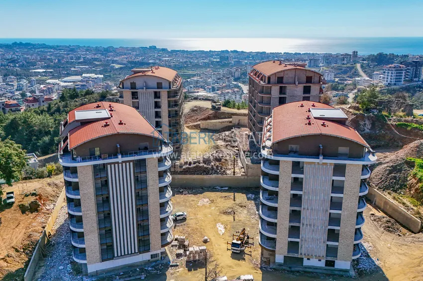 Фото - Новый стильный инвестиционный проект на этапе строительства в районе Оба, Алания 1