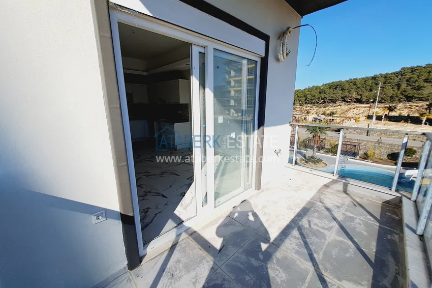 Приобрести Двухкомнатная квартира с чистовой отделкой в Алании, район Авсаллар 10 