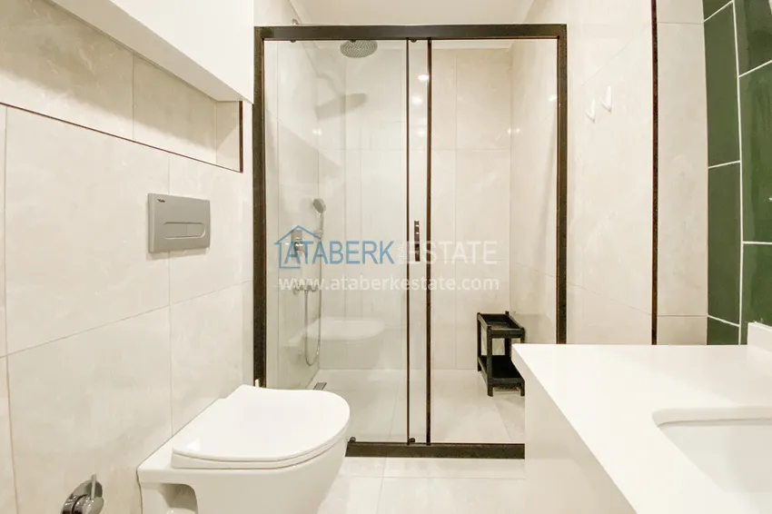 Приобрести Двухкомнатная квартира в современном комплексе – центр Алании, р-н пляжа Клеопатра 10 