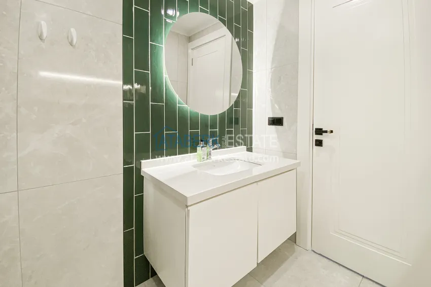 Приобрести Двухкомнатная квартира в современном комплексе – центр Алании, р-н пляжа Клеопатра 11 