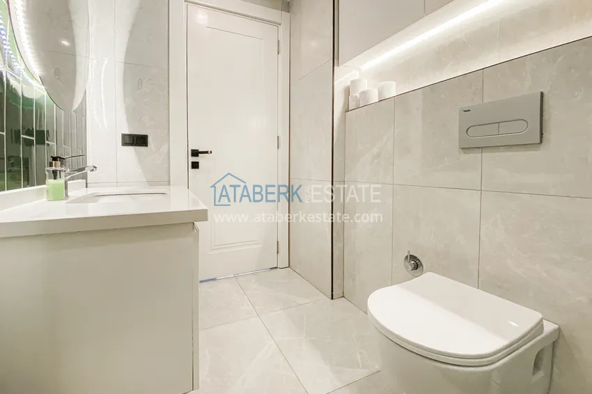 Приобрести Двухкомнатная квартира в современном комплексе – центр Алании, р-н пляжа Клеопатра 12 