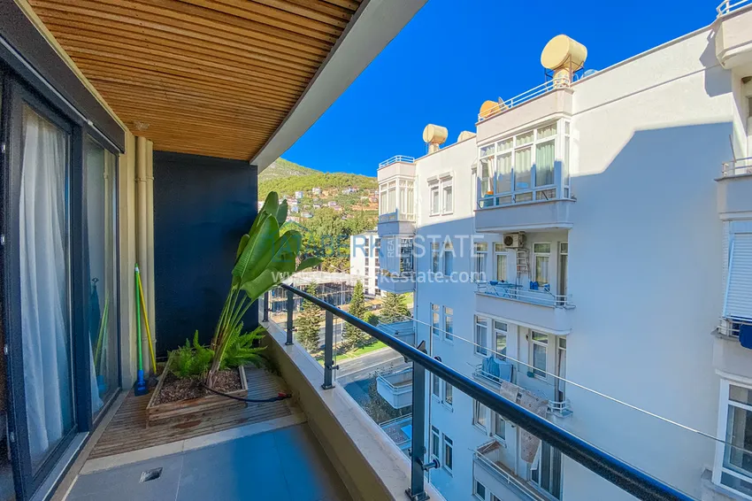 Приобрести Двухкомнатная квартира в современном комплексе – центр Алании, р-н пляжа Клеопатра 15 