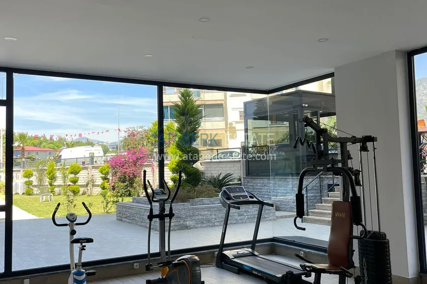 Трехкомнатная квартира с панорамным видом на море и горы в центре Махмутлара 15 