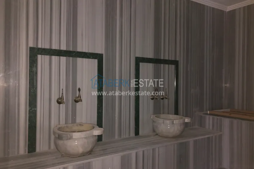 Трехкомнатная квартира с панорамным видом на море и горы в центре Махмутлара 17 