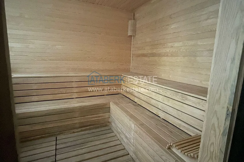 Трехкомнатная квартира с панорамным видом на море и горы в центре Махмутлара 18 