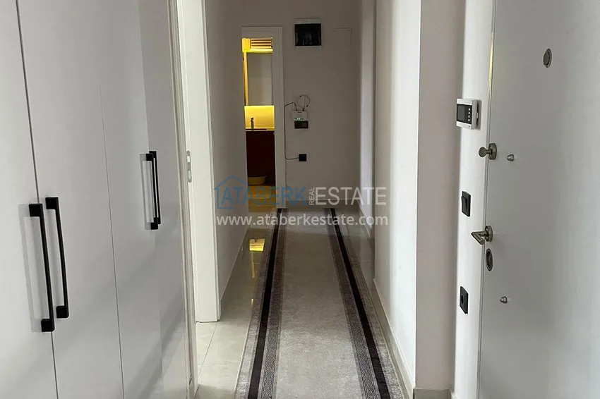 Приобрести Трехкомнатная квартира с панорамным видом на море и горы в центре Махмутлара 1 