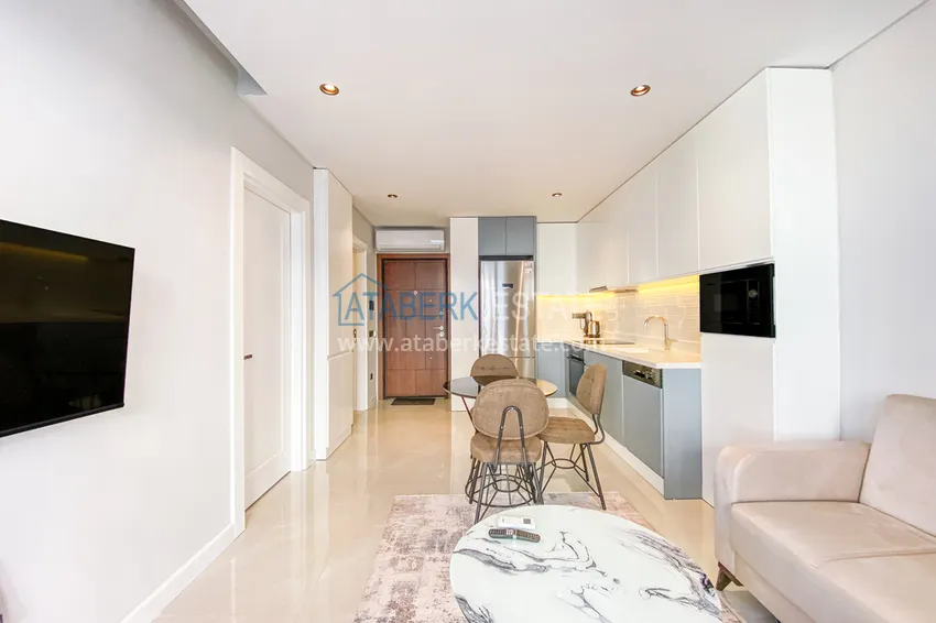 Приобрести Двухкомнатная квартира в современном комплексе – центр Алании, р-н пляжа Клеопатра 1 