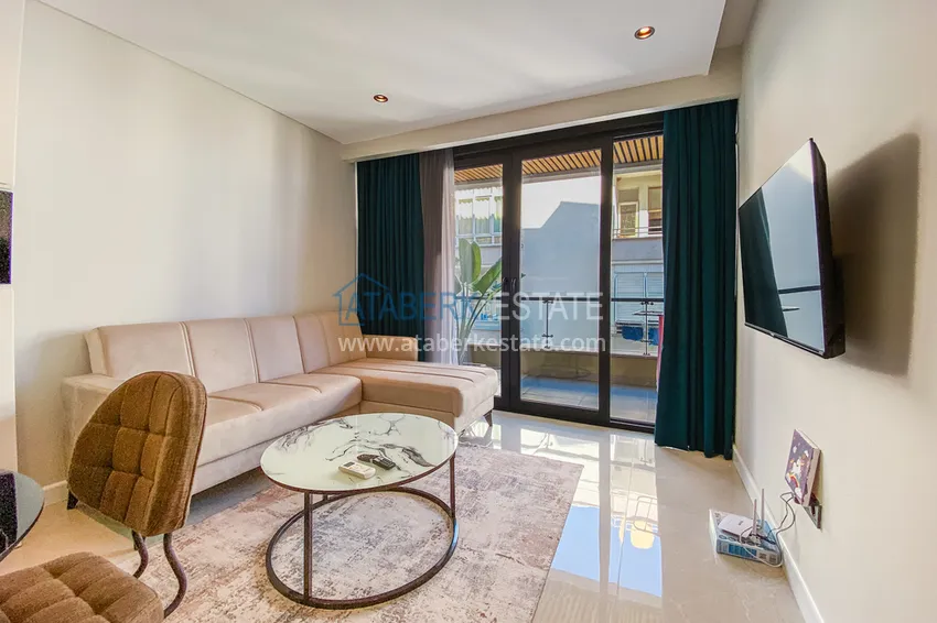 Приобрести Двухкомнатная квартира в современном комплексе – центр Алании, р-н пляжа Клеопатра 2 