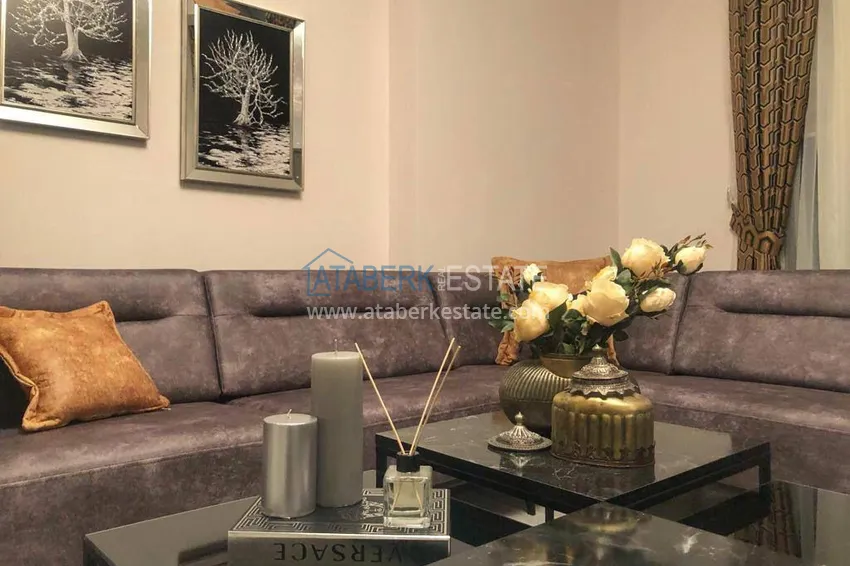 Приобрести Трехкомнатная квартира с панорамным видом на море и горы в центре Махмутлара 3 