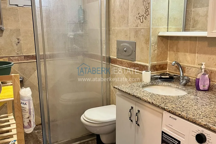 Приобрести Квартира 1+1 площадью 72 м2 в центре Алании с новой мебелью и двумя балконами - район пляжа Клеопатра 3 