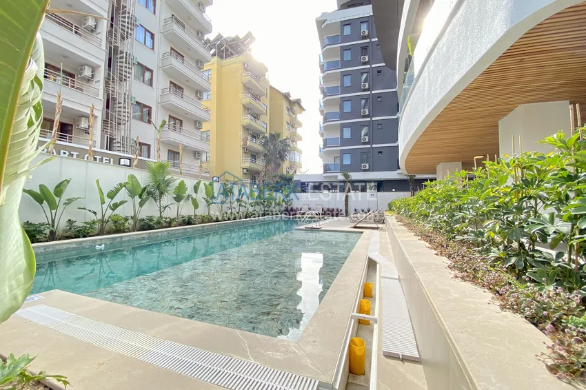 Двухкомнатная квартира в современном комплексе – центр Алании, р-н пляжа Клеопатра 5 