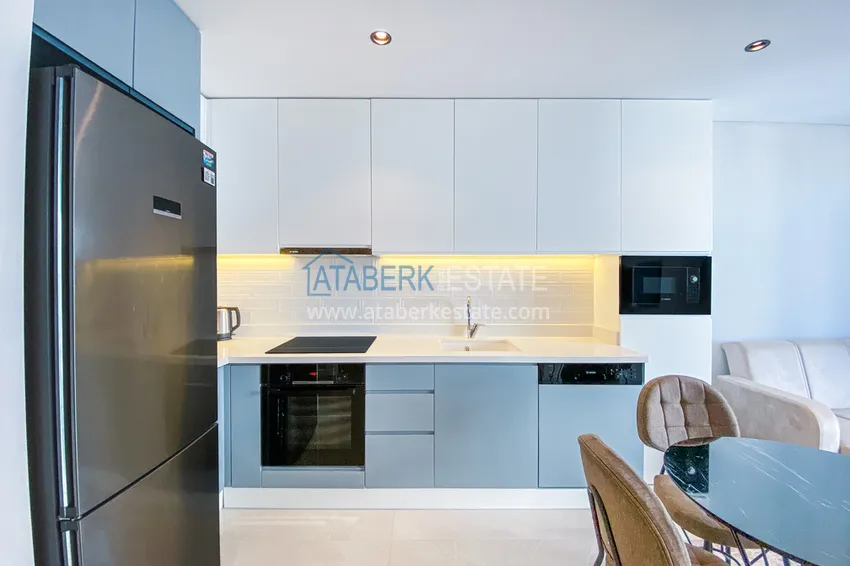 Приобрести Двухкомнатная квартира в современном комплексе – центр Алании, р-н пляжа Клеопатра 6 