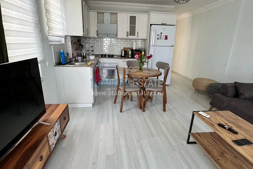 Приобрести Квартира 1+1 площадью 72 м2 в центре Алании с новой мебелью и двумя балконами - район пляжа Клеопатра 6 