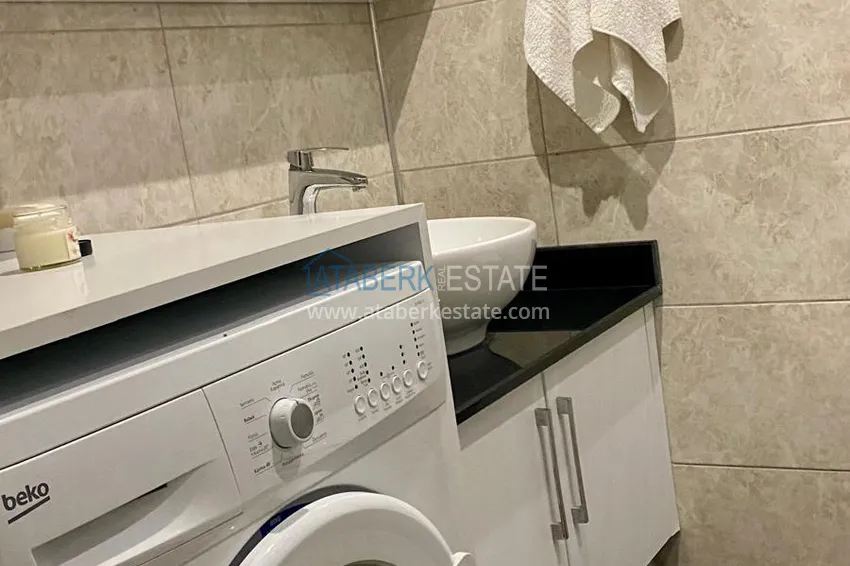 Приобрести Просторная двухкомнатная квартира с мебелью в Махмутларе – 250 метров от моря 7