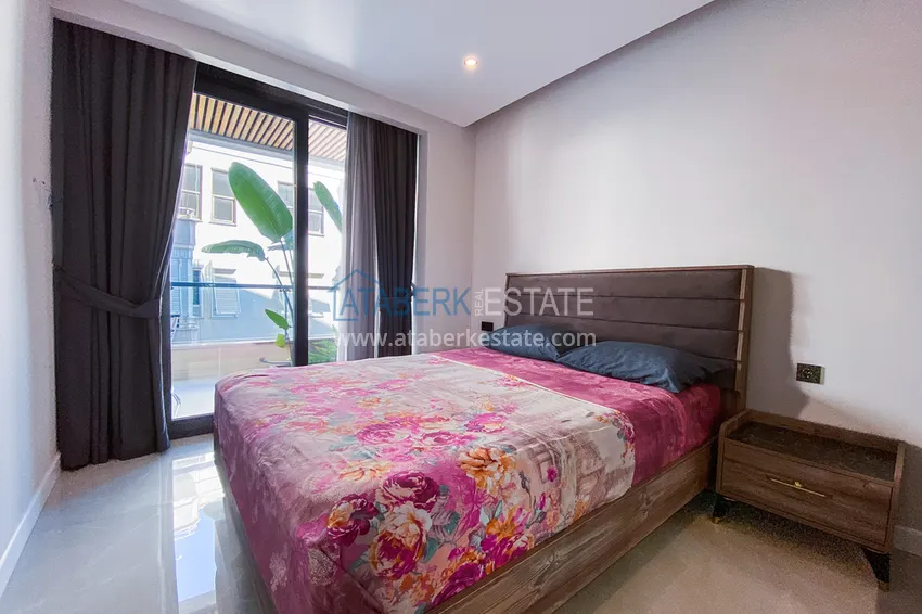 Приобрести Двухкомнатная квартира в современном комплексе – центр Алании, р-н пляжа Клеопатра 7 