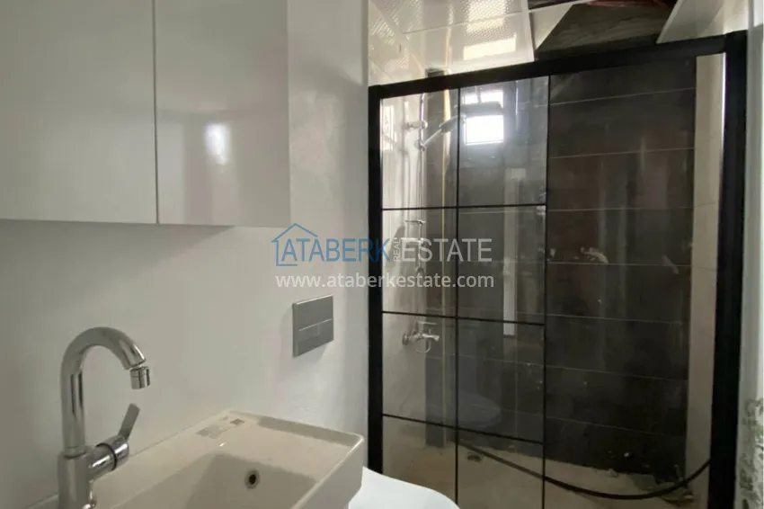 Приобрести Новая квартира 1+1 в 250 метрах от моря – район Арпачбахшиш, Мерсин 9 