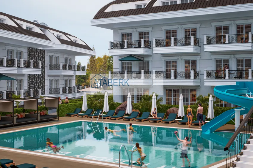 Новый архитектурный шедевр на побережье Алании, район Тюрклер – инвестиционный проект с виллами и апартаментами 11