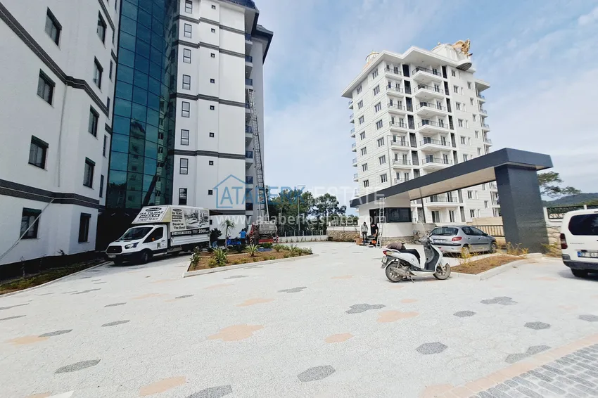 Первичная недвижимость в Алании - квартира 1+1 с чистовой отделкой в районе Авсаллар 13 