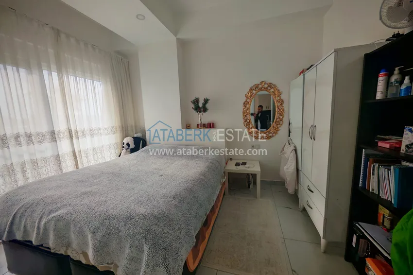 Приобрести Квартира 1+1 с мебелью и участком земли в жилом комплексе - Алания, район Авсаллар 11