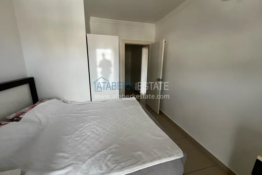 Приобрести Двухуровневый пентхаус с мебелью в центре Алании – район пляжа Клеопатра  13 