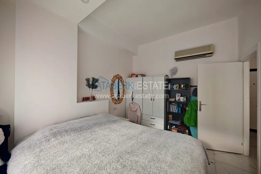 Приобрести Квартира 1+1 с мебелью и участком земли в жилом комплексе - Алания, район Авсаллар 12