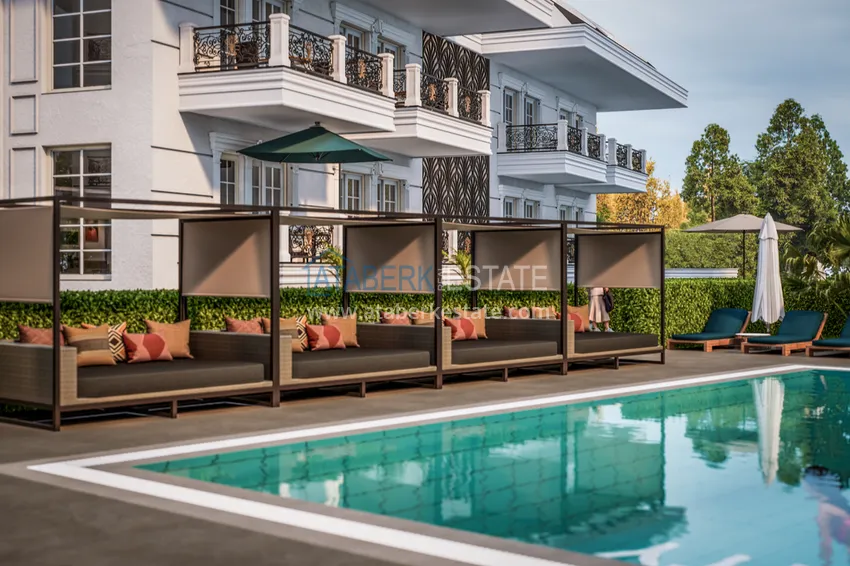 Новый архитектурный шедевр на побережье Алании, район Тюрклер – инвестиционный проект с виллами и апартаментами 14