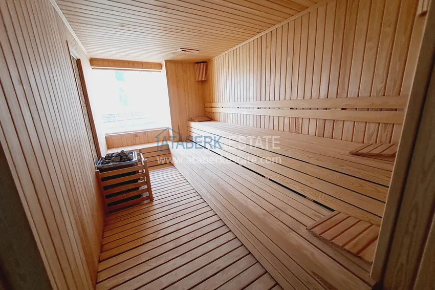 Первичная недвижимость в Алании - квартира 1+1 с чистовой отделкой в районе Авсаллар 22 